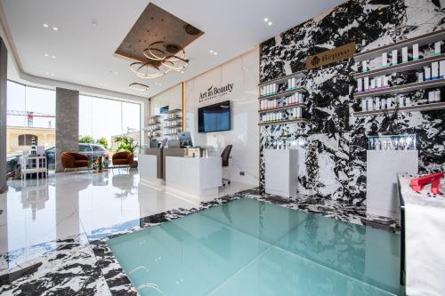a lobby of a store with a glass floor at Artist Terrace Apartments in Mellieħa