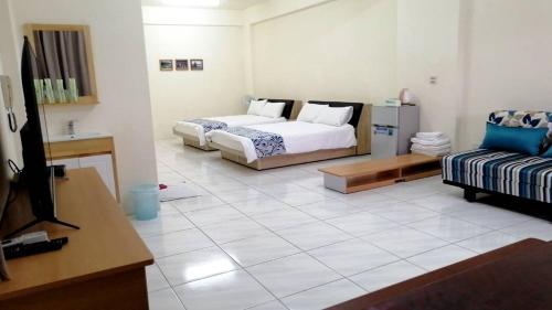 Sanyi Homestayにあるベッド