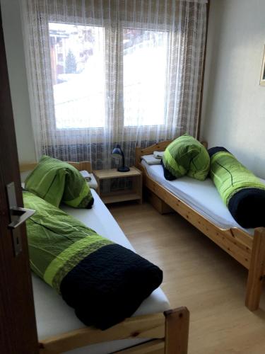 Ένα ή περισσότερα κρεβάτια σε δωμάτιο στο Haus Opal,Wohnung 21