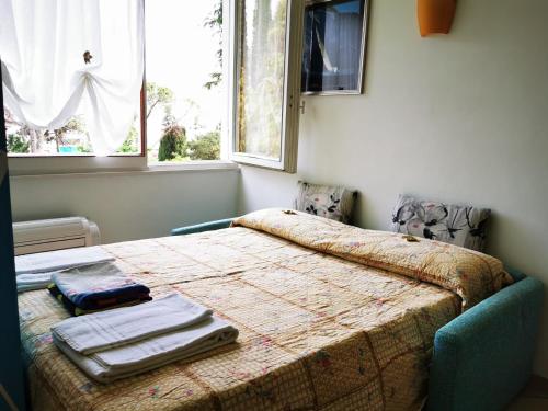Katil atau katil-katil dalam bilik di Garda Apartments in Euroresidence