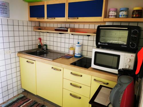 Dapur atau dapur kecil di Garda Apartments in Euroresidence