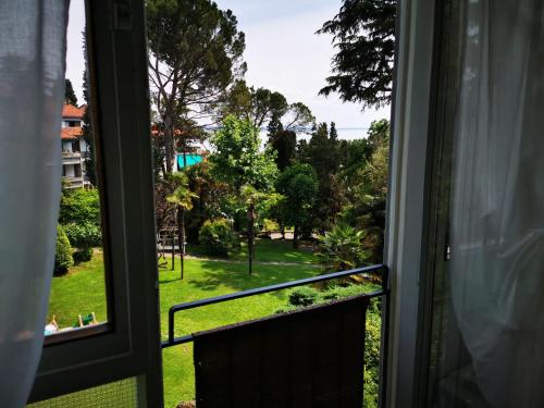 Taman di luar Garda Apartments in Euroresidence