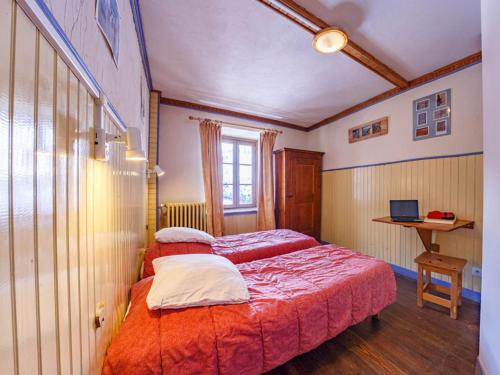 Postel nebo postele na pokoji v ubytování Auberge l'Estoilies