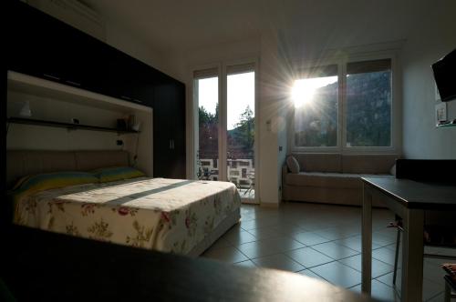 Katil atau katil-katil dalam bilik di Garda Apartments in Euroresidence