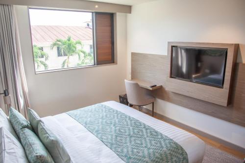Postel nebo postele na pokoji v ubytování Lava Hotel