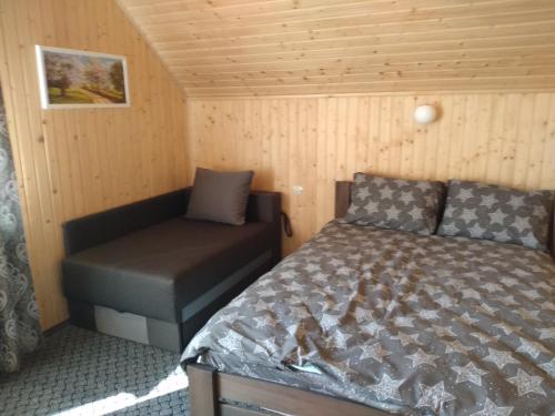 Postel nebo postele na pokoji v ubytování Apartments in Polyana