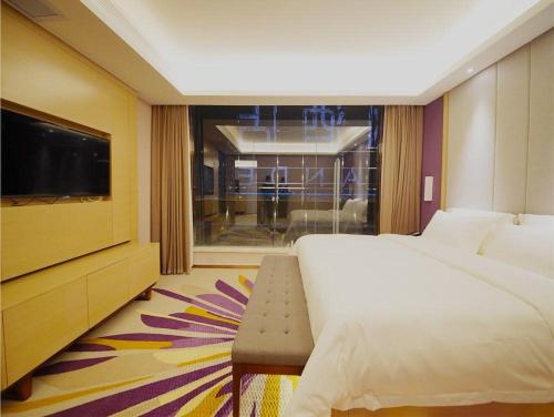 Postel nebo postele na pokoji v ubytování Lavande Hotel Heyuan Longchuan
