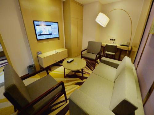 Χώρος καθιστικού στο Lavande Hotel Xingyi Jushan Avenue