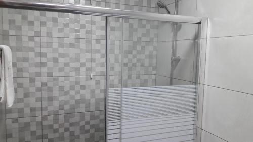 a shower with a glass door in a bathroom at Hotel S. Gabriel in Porto