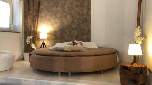 A bed or beds in a room at Boncompagni Suite Roma