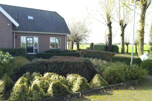 Taman di luar Accommodatie op boerderij Buitenlust