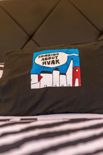 a tshirt with a picture of a train on a bed at Historic center Hvar town- a few steps from the main square in Hvar