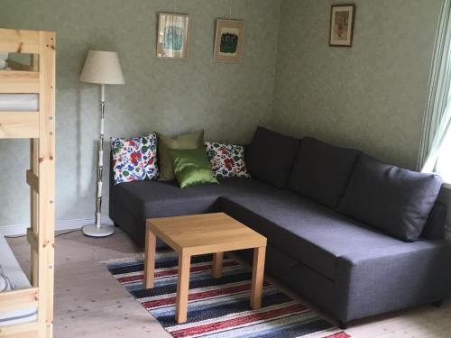 Posezení v ubytování Tättas stuga på Malingsbo Herrgård