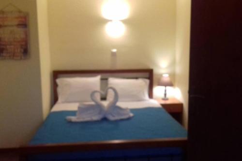 Cama o camas de una habitación en Kaktos 1
