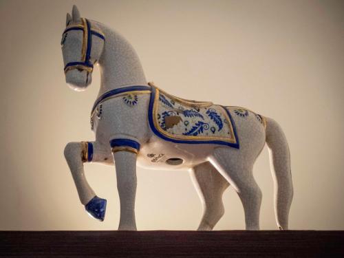 a figurine of a horse standing on a table at Pension Ciudadela in Barcelona