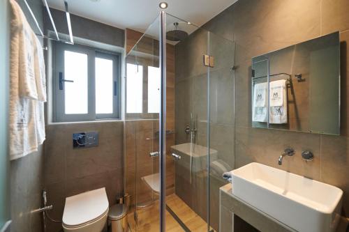 Koupelna v ubytování Meni Hotel & Apartments