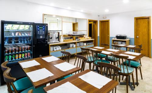 Kuchyň nebo kuchyňský kout v ubytování Hotel Portuense Lisboa