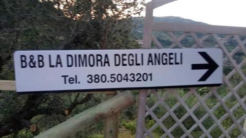 a sign that reads bbc dino durango detail angelell at la dimora degli angeli in Perugia