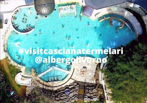 an overhead view of a swimming pool at a resort at Albergo Livorno in Casciana Terme