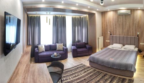 Postel nebo postele na pokoji v ubytování Viva Hotel
