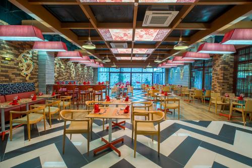 Numa Bay Exclusive Hotel - Ultra All Inclusiveにあるレストランまたは飲食店