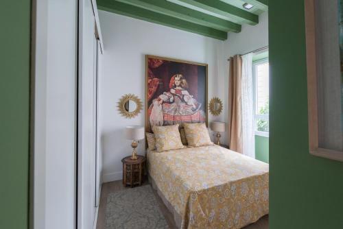 Llit o llits en una habitació de DreamsApt Plaza Nueva