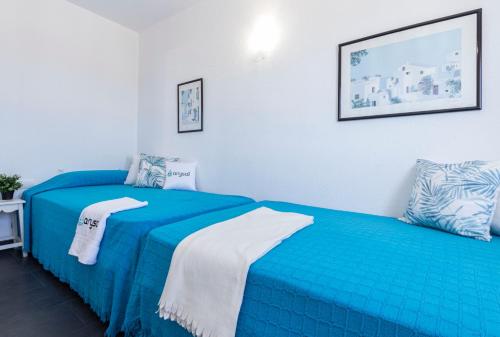 Кровать или кровати в номере Apartamento Rodas Arysal