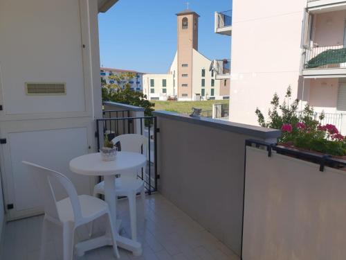 Un balcón o terraza en Calypso Bed and Beach