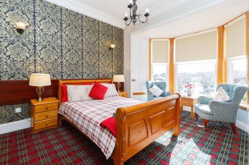 מיטה או מיטות בחדר ב-Castle Walk Bed & Breakfast