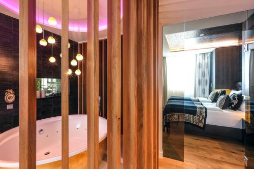 Un ou plusieurs lits dans un hébergement de l'établissement BLOCK Hotel & Living