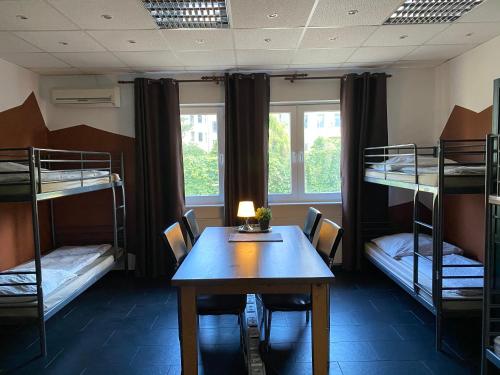 Ένα ή περισσότερα κρεβάτια σε δωμάτιο στο PREMIUM Hostel