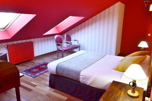 Ein Bett oder Betten in einem Zimmer der Unterkunft Hotel Alda Vía León