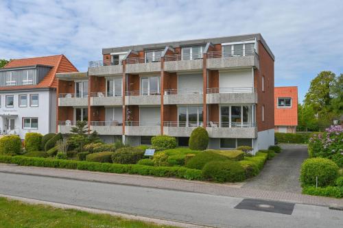 an apartment building on the side of a street at Haus am Deich Wohnung 12 in Dahme