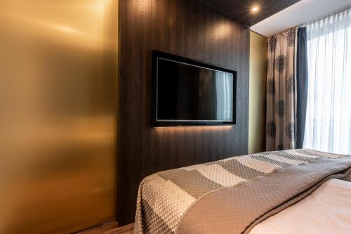 Un ou plusieurs lits dans un hébergement de l'établissement BLOCK Hotel & Living