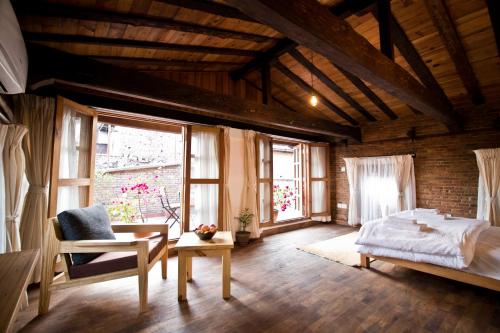 Ένα ή περισσότερα κρεβάτια σε δωμάτιο στο Imperial Duplex In Old Patan