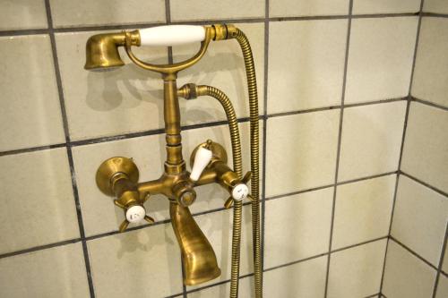 Ein Badezimmer in der Unterkunft Hotel Alda Vía León