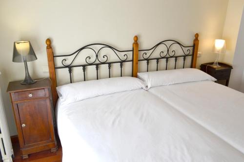 Ein Bett oder Betten in einem Zimmer der Unterkunft Hotel Alda Vía León