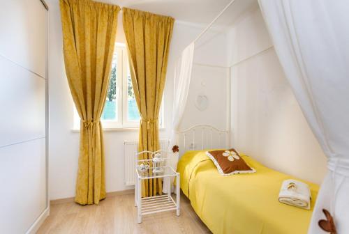 Voodi või voodid majutusasutuse Villa Ivetta toas