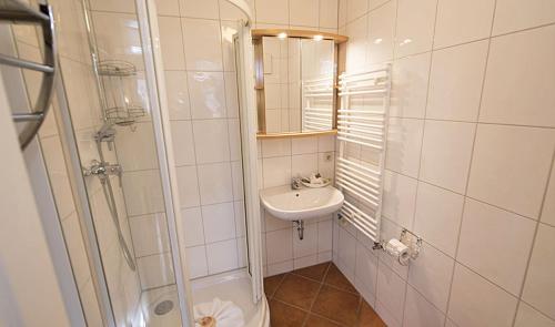 Et badeværelse på Ferienwohnung Strandperle