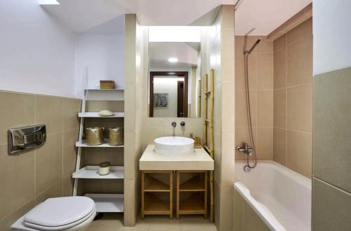 Et badeværelse på Apartamento T2 Herdade dos Salgados