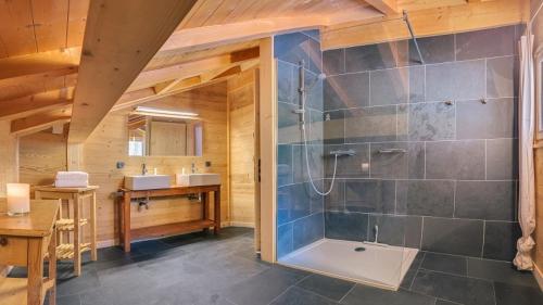 a bathroom with a shower and a sink at Les 4 Chamois - Chalet - BO Immobilier in Abondance
