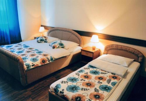 Katil atau katil-katil dalam bilik di Motel Neno