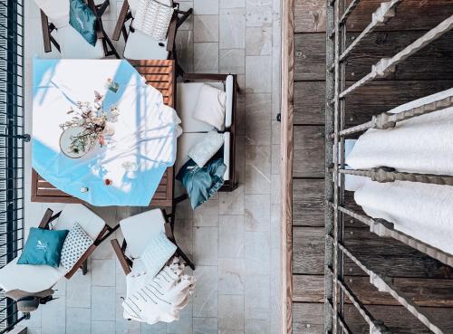 an overhead view of a room with pillows and a table at Pr' Kramarju - House in the heart of Kobarid in Kobarid