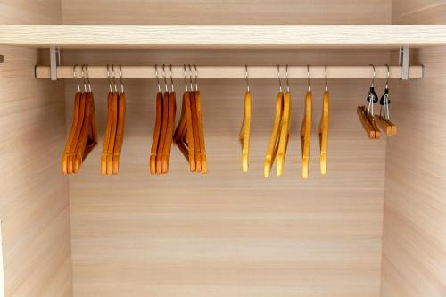 a row of utensils hanging on a shelf at Sloepenlaan 7.01.02 in De Panne