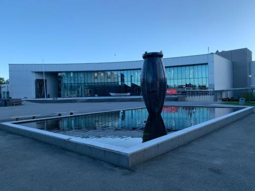 Bazén v ubytování Husnes Sentrum Hotell nebo v jeho okolí