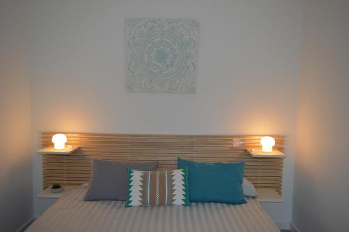 Un pat sau paturi într-o cameră la Villa Uhaïna Hossegor