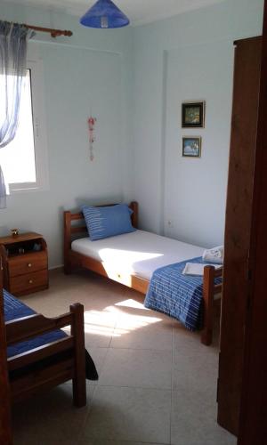 Postel nebo postele na pokoji v ubytování Porcelanico Home
