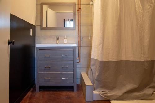 A bathroom at Center City Loft, CONTACTLESS CHECK IN, Mayor's Study