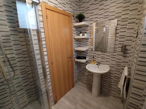 Kúpeľňa v ubytovaní Apartamento Eursu centro con piscina