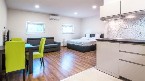 Posedenie v ubytovaní White Apartman Siófok 2